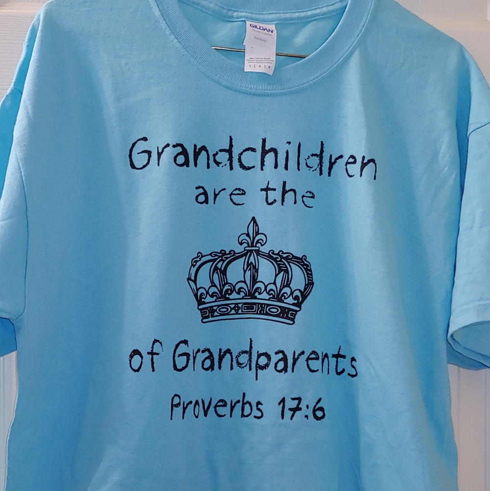 L blue shirt with Grandchildren are the Crown of..